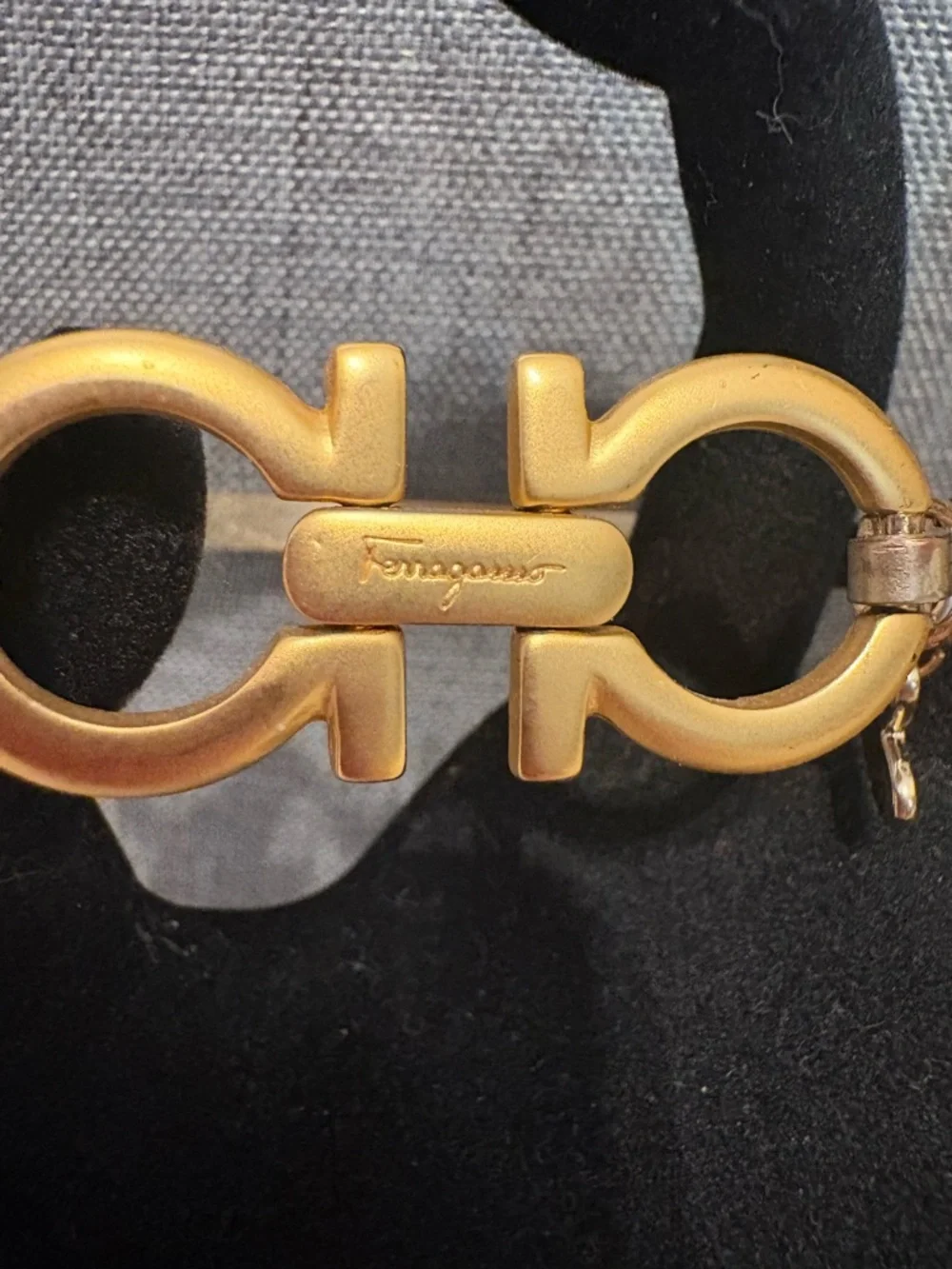 Authentic Salvatore Ferragamo charm set on unbranded bangle bracelet
